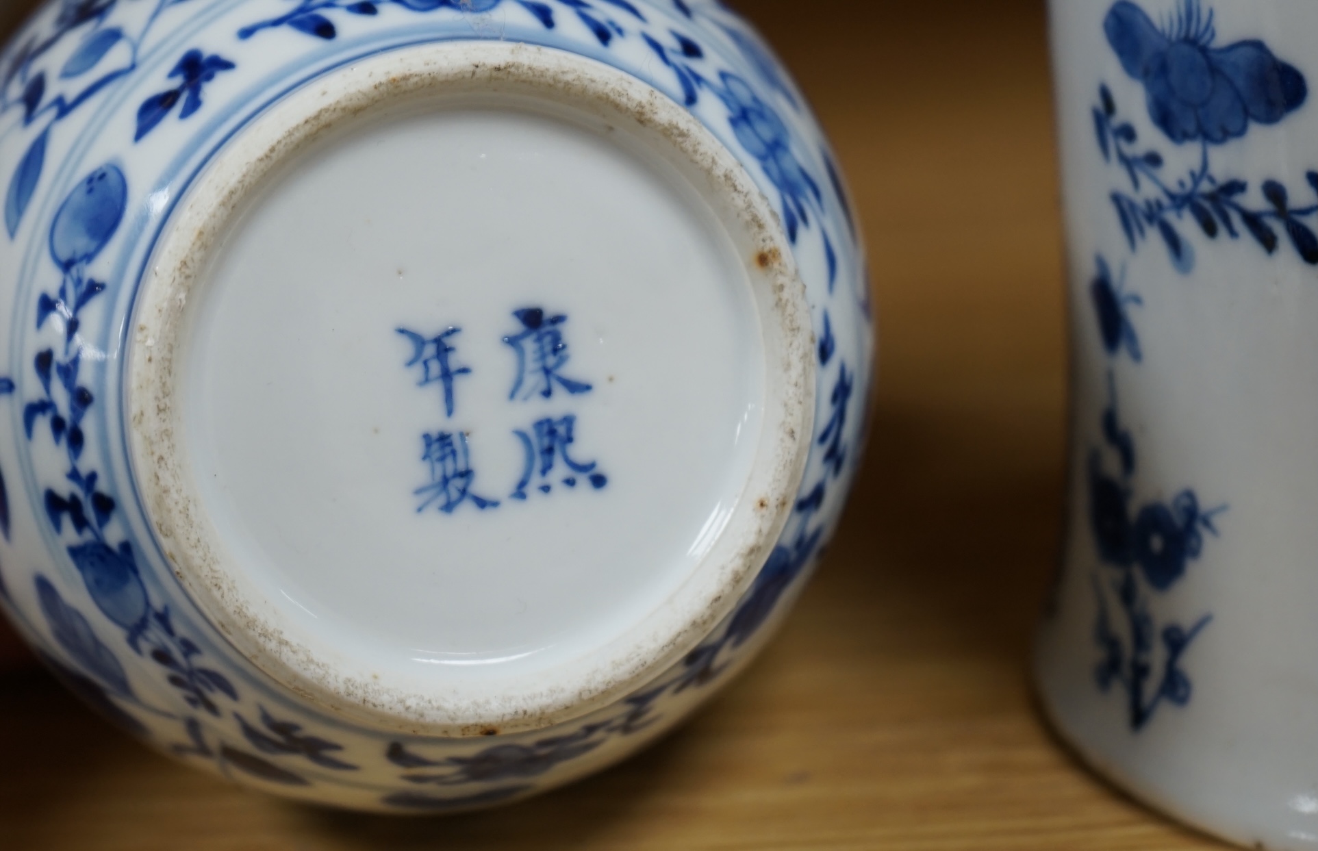 A pair of Chinese blue and white double gourd shaped vases, 19th century and a large export tankard, 18th century, largest 19cm high. Condition - poor